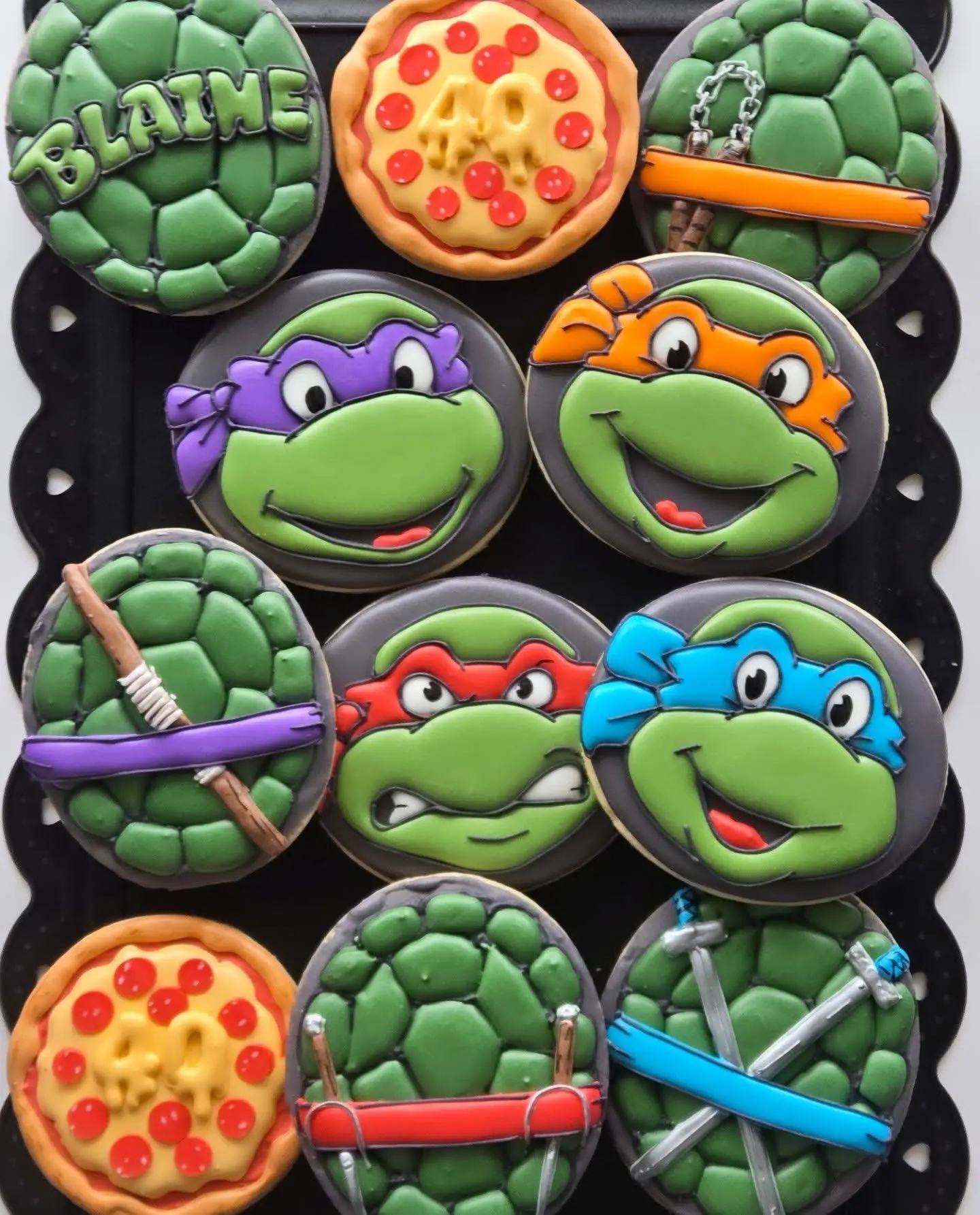 Teenage Mutant Ninja Turtles themed custom sugar cookies with Leonardo, Donatello, Raphael, Michelangelo, pizza and weapons — Kelowna